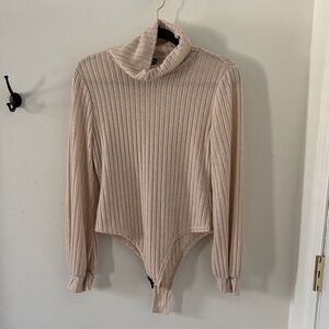 Beige “SHEIN” bodysuit, size large.